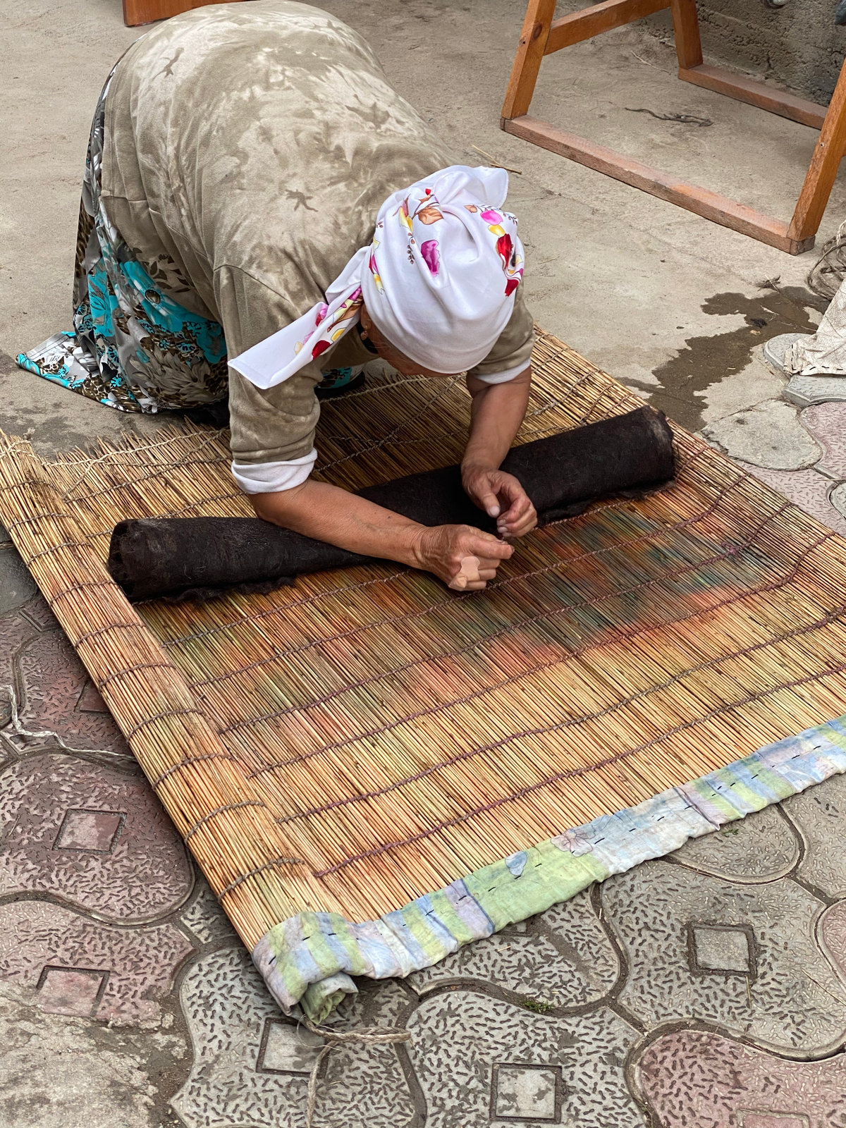 Rolling and pressing the felt by hand